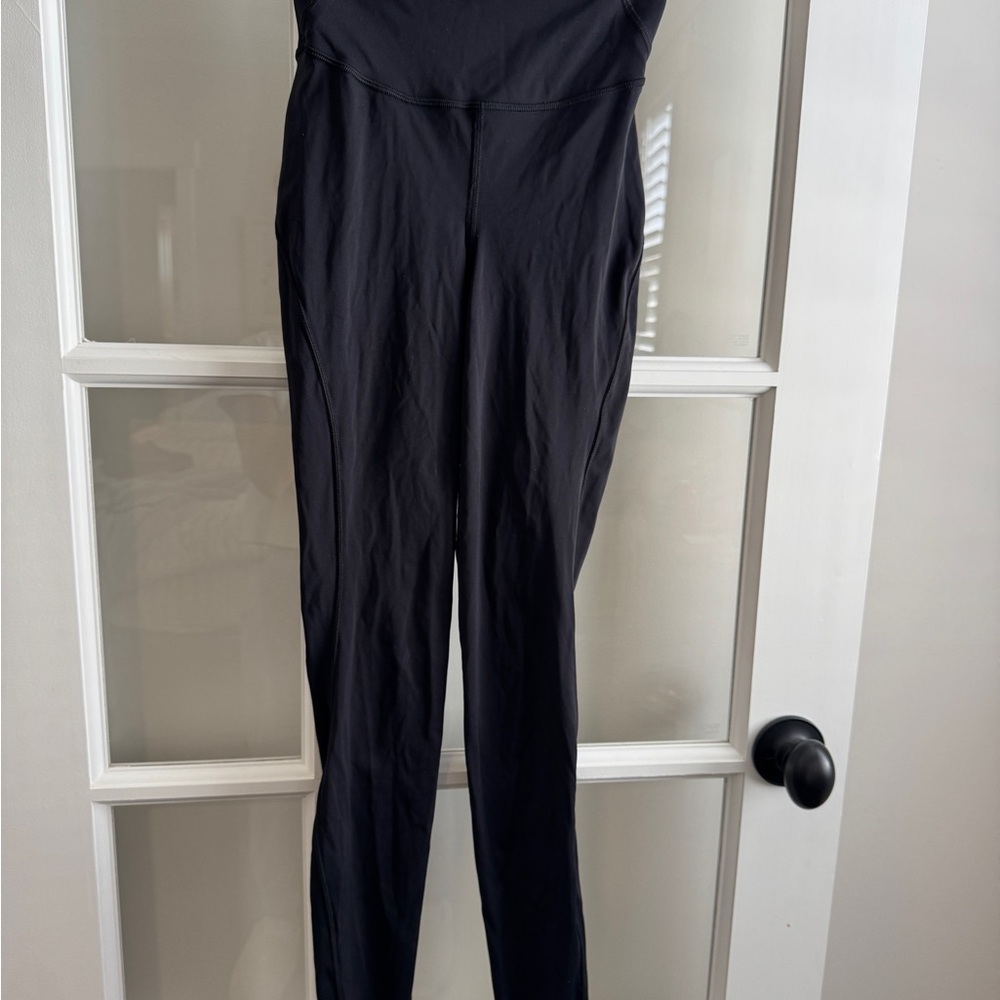 Lululemon black raw hem leggings. 25” length
